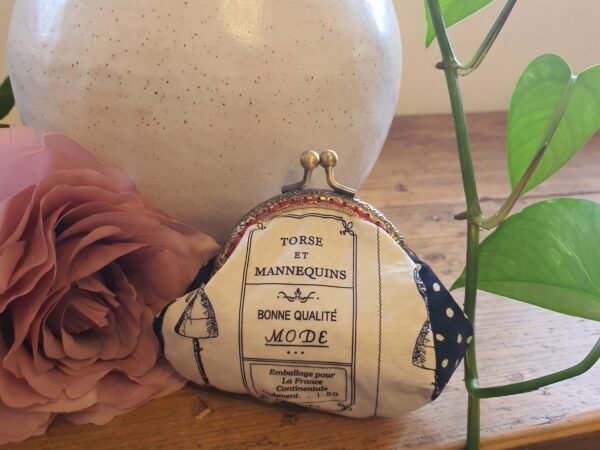 vintage French typography purse 3x4 Handmade vintage French typography coin purse with French text reading "Torse et Mannequins" and antique metal kiss-lock clasp