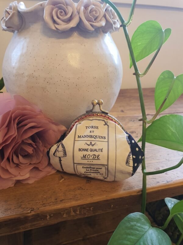 vintage French typography purse 3x4 Handmade vintage French typography coin purse with French text reading "Torse et Mannequins" and antique metal kiss-lock clasp