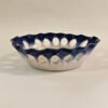 bowl-blue-cutout-3x4 Handbuilt oval ceramic dish with scalloped rim and oval cut-outs in cobalt blue glaze